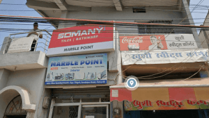 MAIN ROAD PROPERTY IN CITY CENTER JUST OPPOSITE TO SANICHRA MANDIR RENTAL INCOME - 2 LAKH APPROX WEST FACING , 26 FT FRONT  FACING 40FT ROAD BOYS HOSTEL HAVING 44 DOUBLE BEDROOM 8 BATHROOMS AND 2 COMMERCIAL SHOPS .